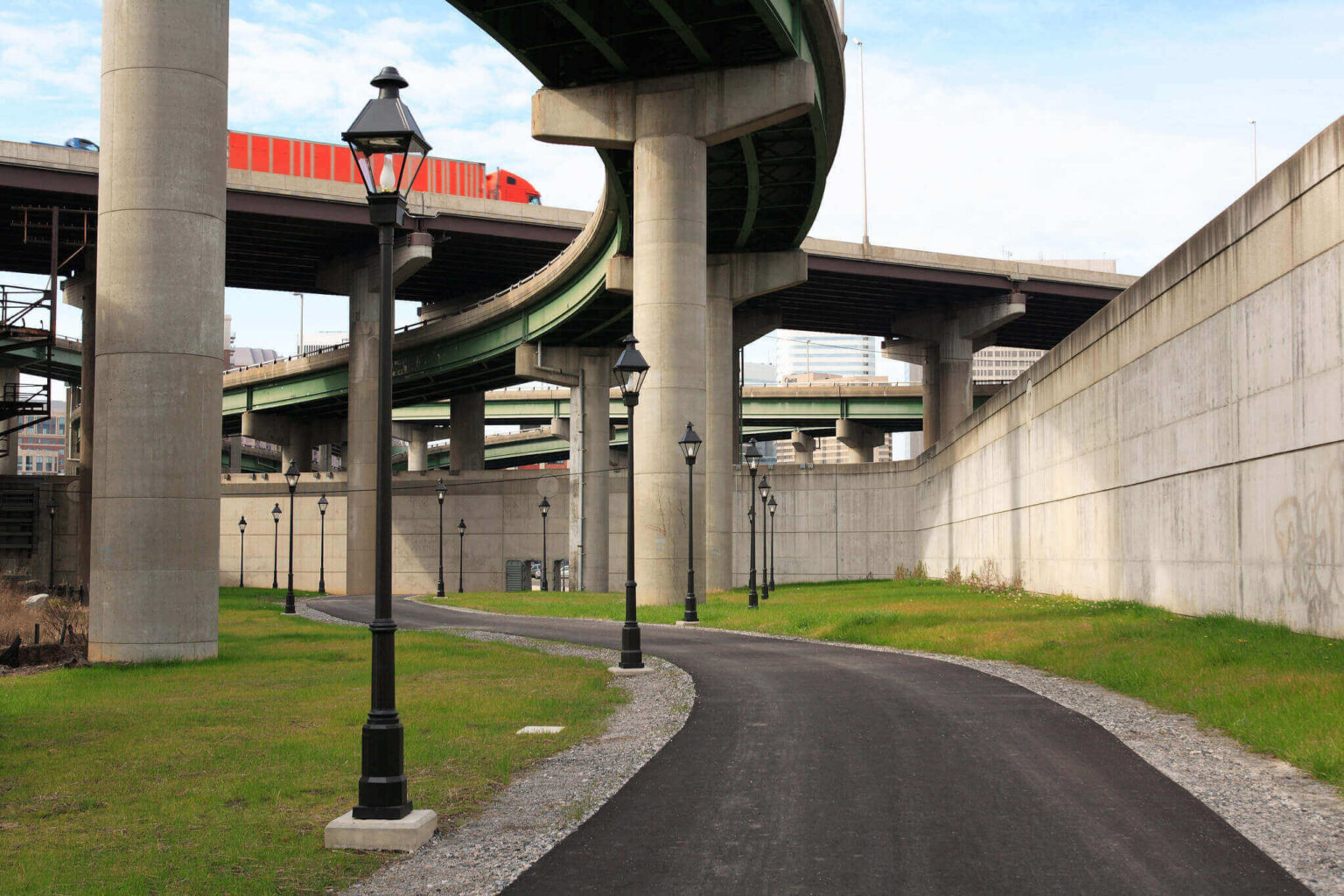 Underneath I-95 and flyovers to I-195 the floodwall portion of the Virginia Capital Trail