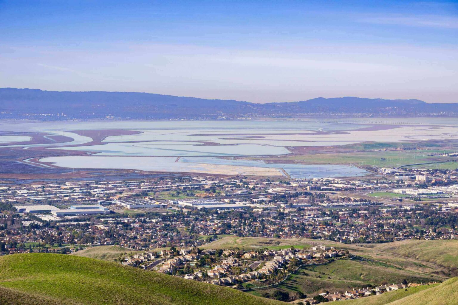 aerial view of town and body of water